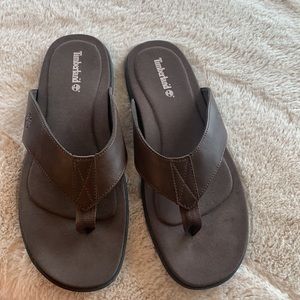 New Timberland flip flops.